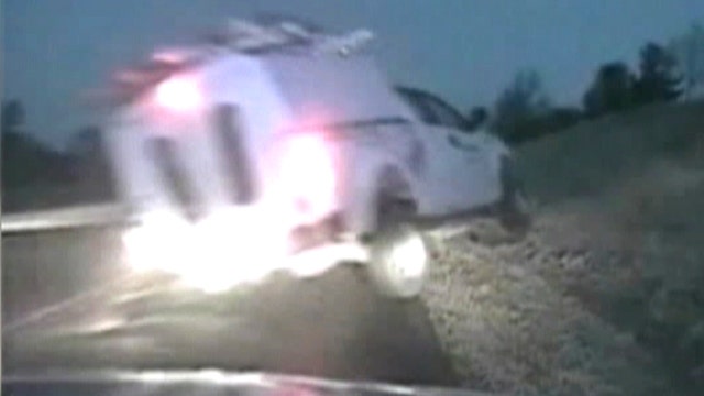 Truck flies off road injuring trooper responding to crash