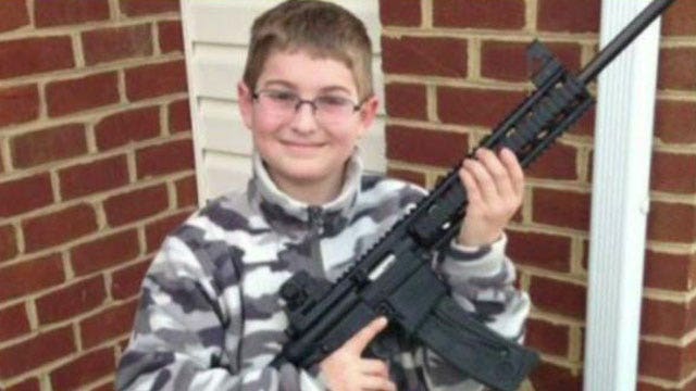 Picture of child holding gun prompts police probe