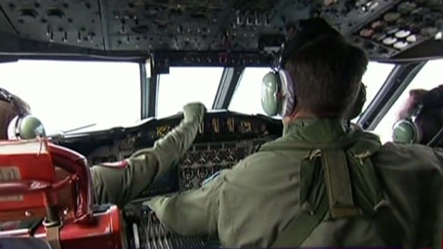 Searchers scan area 1,500 miles off Australia for Flight 370