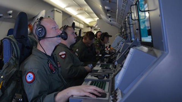 Crews battle dangerous waters in search for Flight 370