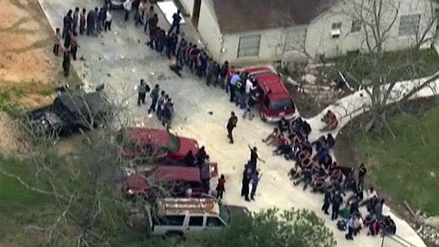 Police rescue more than 100 immigrants in stash house