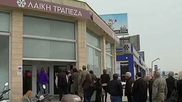 Cyprus avoids bankruptcy with 'painful' deal