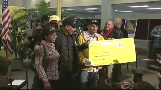 Pedro Quezada Collects $338M Powerball Check