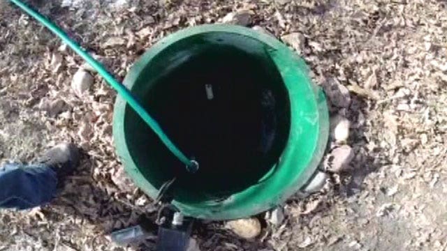 7-year-old rescued from septic tank