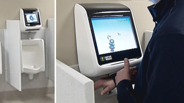 Urinal video games relieve bathroom boredom