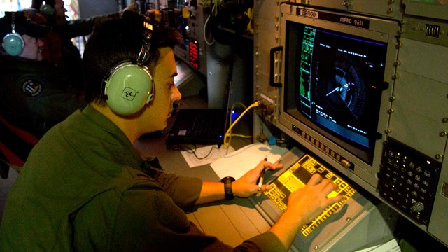 Weather hinders search for Flight 370