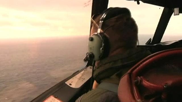 Malaysia Airlines jet search is a matter of 'time and eyes'