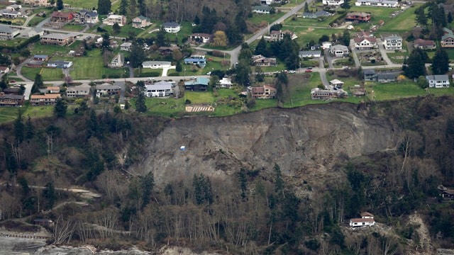 Massive landslide destroys home, threatens 34 others