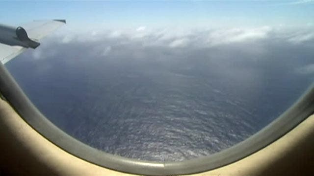 Calmer conditions in new area to help Flight 370 search
