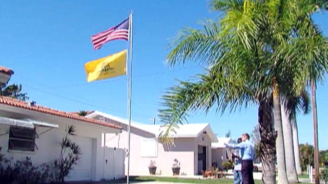 Neighbor complains over vet’s American flag