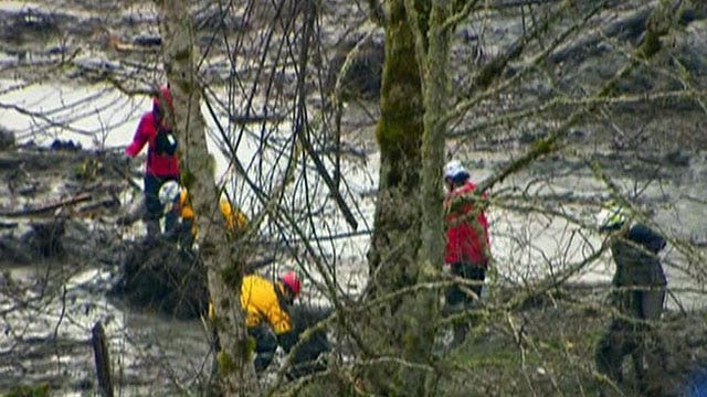 Heavy rains put strain on mudslide search operation