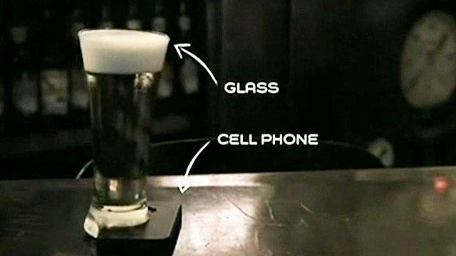 Beer glass keeps bar patrons from looking at phones