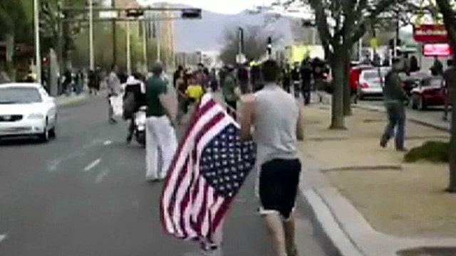 Patriots stop protesters from disrespecting American flag