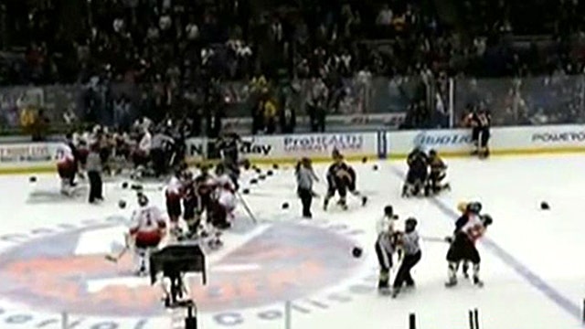 NY's finest, bravest brawl at charity hockey game