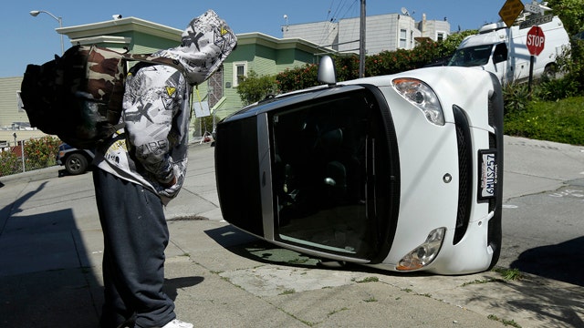 Police seek suspects, motive in Smart car vandalism 
