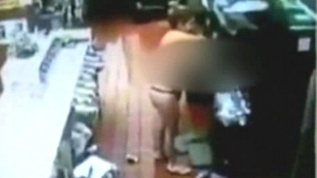 Topless woman's fast food rampage goes viral