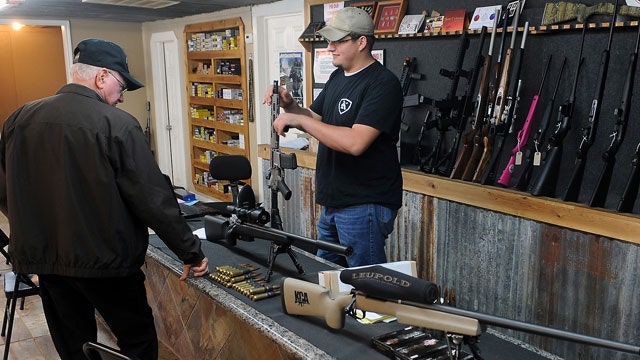 Battle erupts over cost of mandatory gun background checks