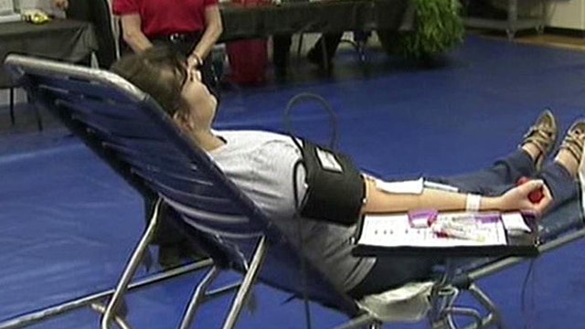 Donating blood to support hospitals and disaster aid