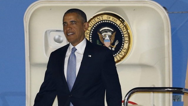 Obama arrives in Japan as US troops are sent to Europe