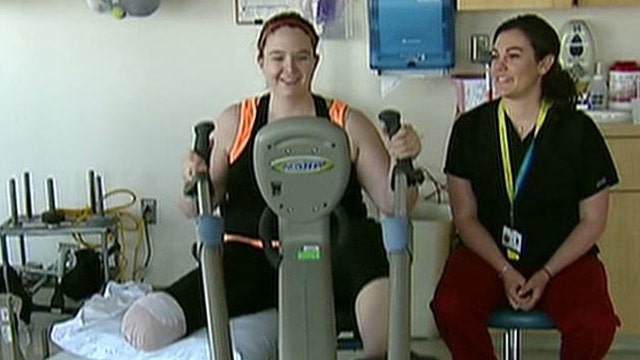 Marathon victims begin challenging rehabilitation programs
