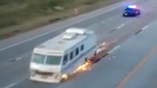 Sparks fly as RV leads swarm of cop cars on high-speed chase