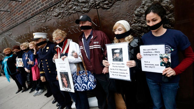 Families protest return of remains to 9/11 memorial