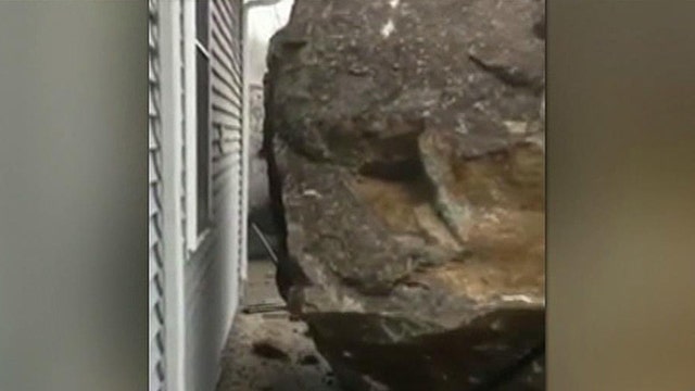 Divine intervention? Giant boulder stops inches from church