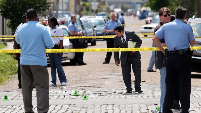 Hunt for gunmen after New Orleans parade shooting