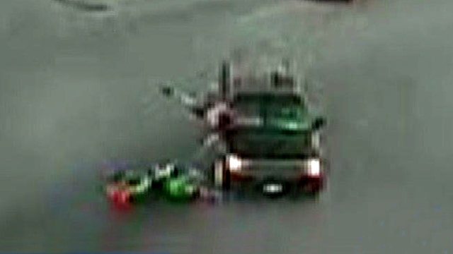 Motorcycle slams head-on into turning SUV