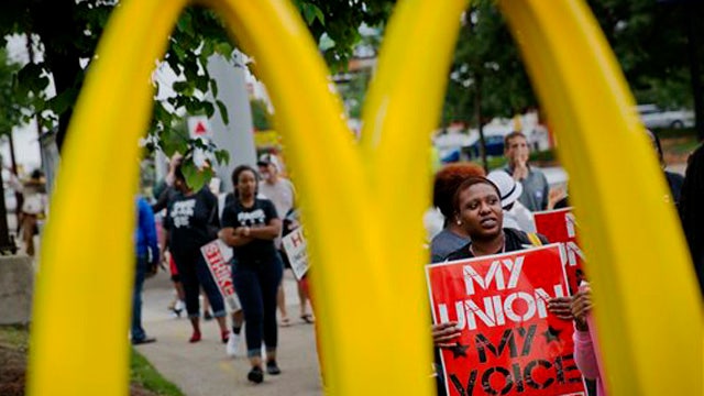 Economy in focus as fast food workers demand higher pay