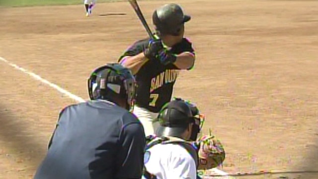 Convicts take on semi-pro team in prison baseball game