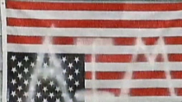 Man arrested for flying American flag upside-down