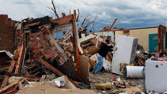 Victims begin to assess damage from devastating tornado