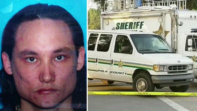 Manhunt for 'armed and dangerous' murder suspect in Fla.