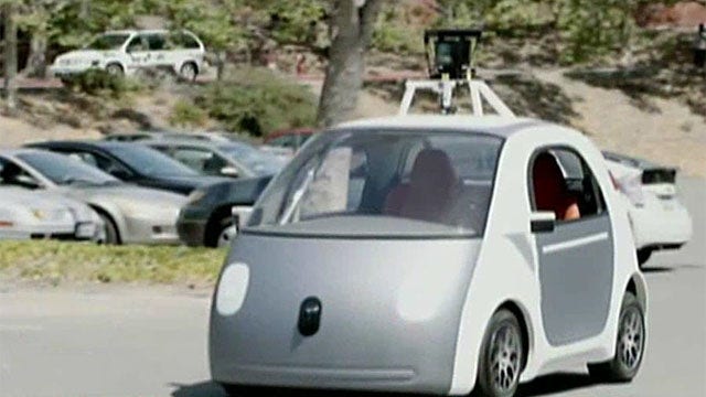 Google building new driverless cars