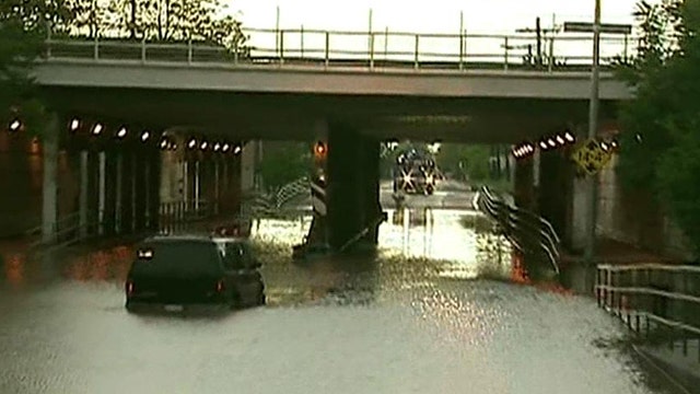  Rain in Chicago suburbs causes flooding and power outages