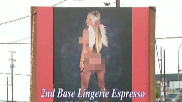 Sign for local coffee shop features nearly nude woman