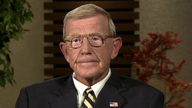 Lou Holtz says tackling head injuries not Obama's obligation