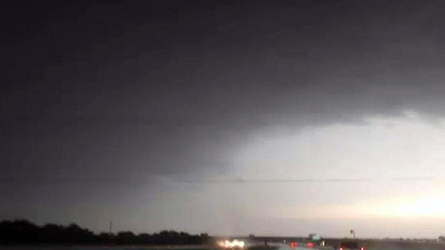 Storm chaser says flying home hit his car
