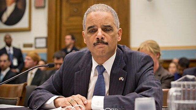 Targeting journalists: Backlash hits Holder, DOJ