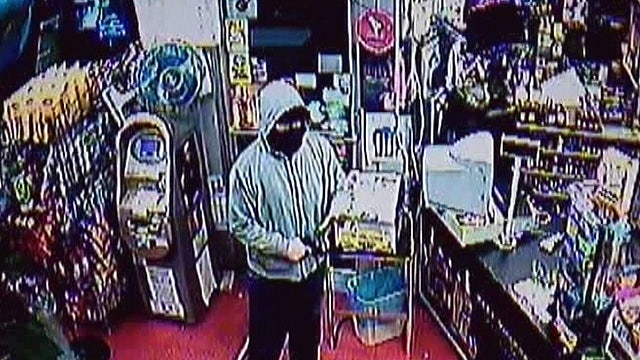 Liquor store owner shocks robber