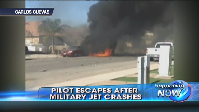 Military jet slams into California neighborhood