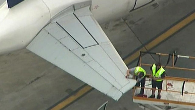Plane damaged after collision at Logan Airport
