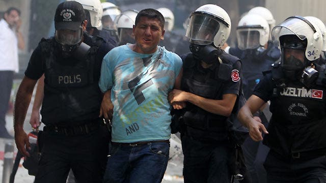 Turmoil in Turkey: Riot police drive protesters from square