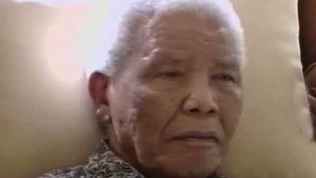 Mandela family members gather around bedside