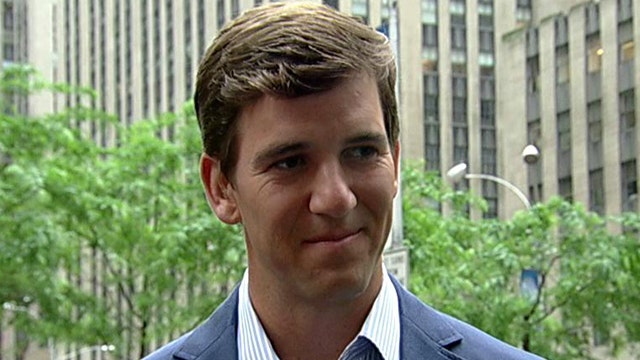 Eli Manning reacts to focus on football concussions