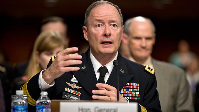 NSA director defends data collection programs