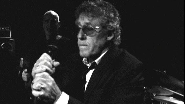 Roger Daltrey rocks out with friend Wilko Johnson