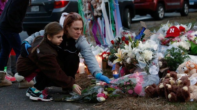 Six months later, Newtown families call for action