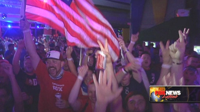 USA soccer fans cheer for their team at the World Cup